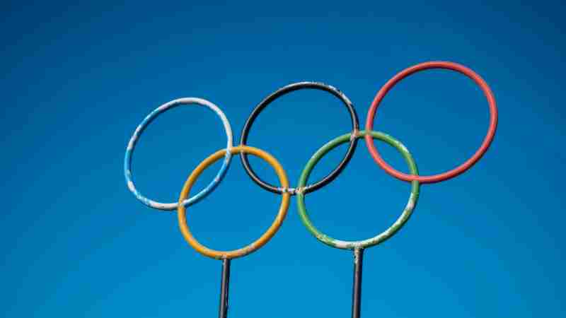 Olympic rings sculpture set against a clear blue sky in Lahti, Finland., tags: paris und - pexel